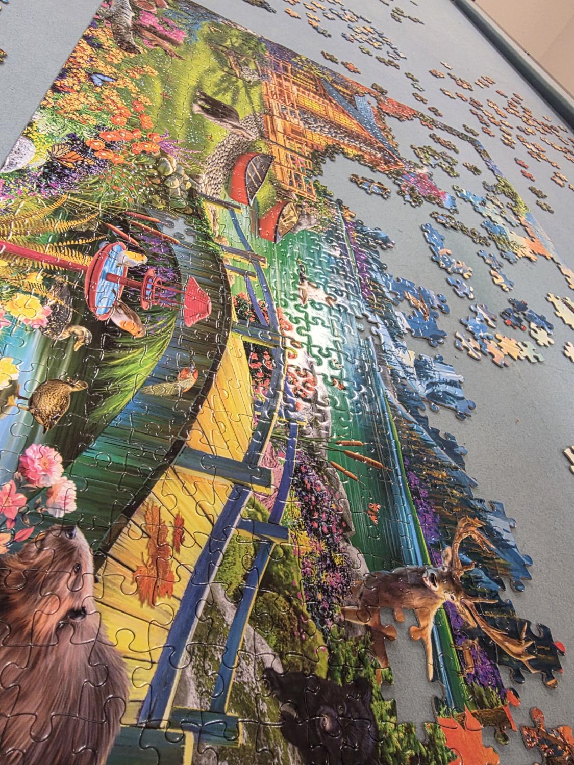 Another angle of the wildlife lodge puzzle with beaver, deer, and cabin
